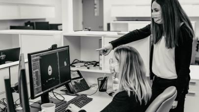 two people at computer