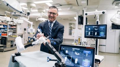 doctor with robotic machine