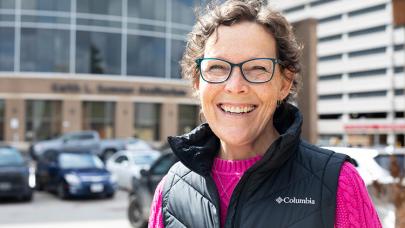 Julie standing in front of LHSC smiling