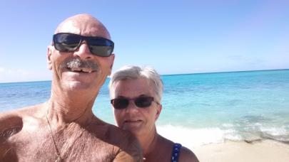 gord and his wife on the beach